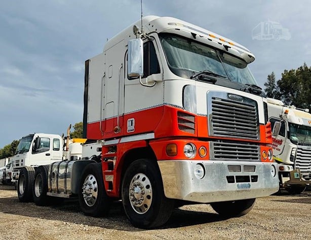 white and red chassis truck